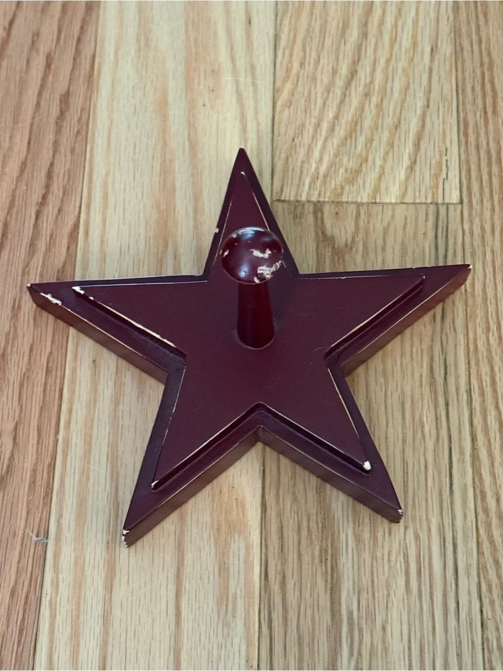 Pottery Barn distressed star shaped wall hooks maroon color 7”